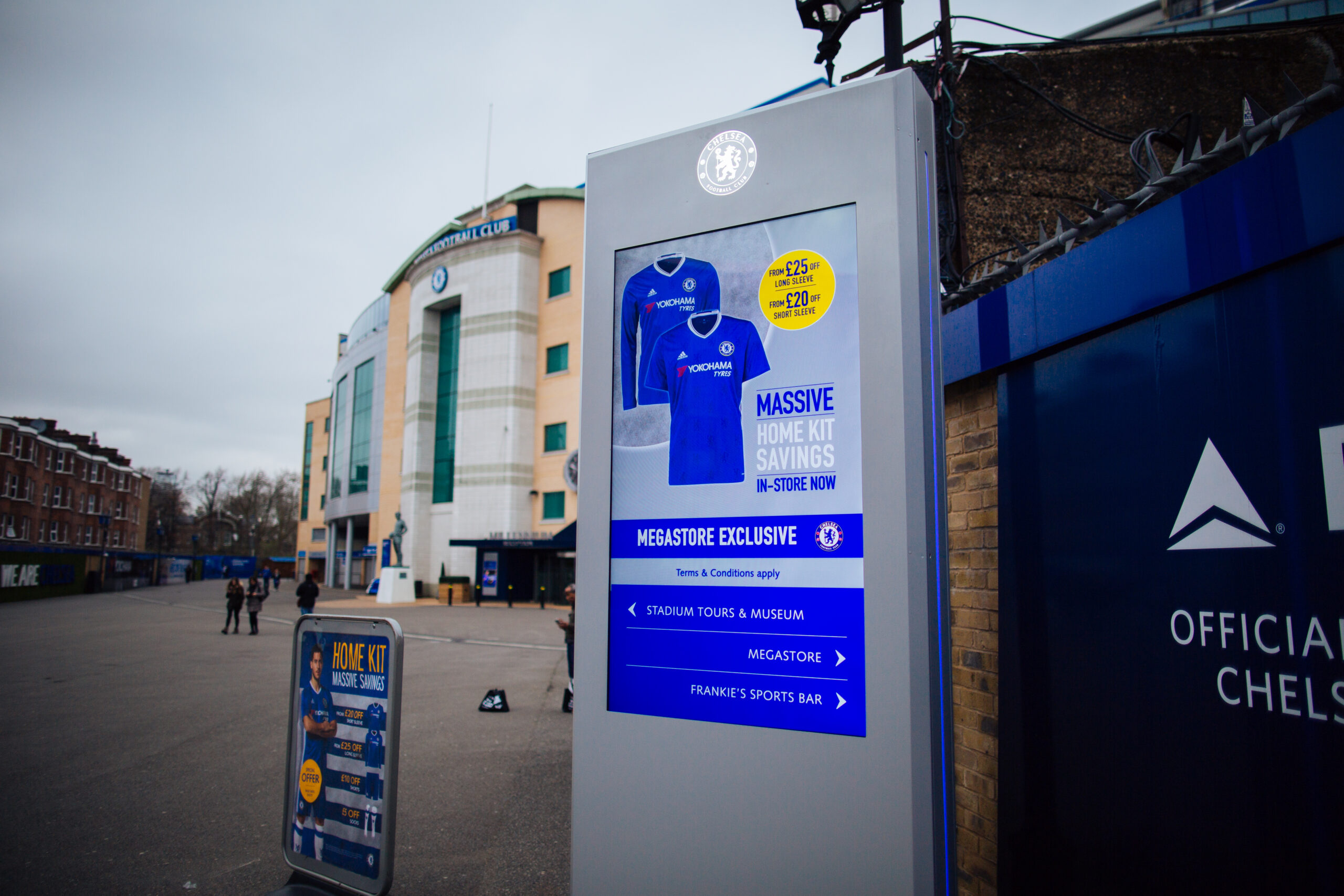 A Digital totem with LCD Screen displaying promotional content at Chelsea FC